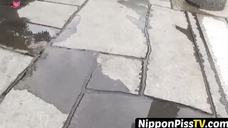 NipponPissTV.com - Real Japanese lady filmed while peeing in closeup outdoors