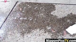 NipponPissTV.com - Real Japanese lady filmed while peeing in closeup outdoors