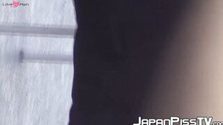 Young Asian cutie outdoors tied up and pees from the ladders