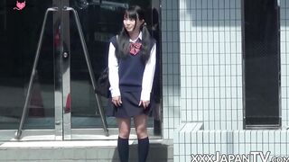 Little Japanese schoolgirl toys pussy over panties in public