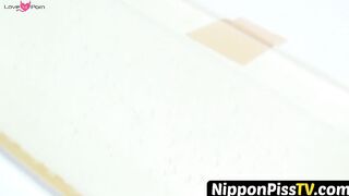 NipponPissTV.com - Real Japanese amateur filmed peeing in public bathroom openly
