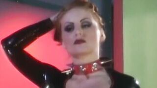 PussyCatsLatex.com - Redhead femdom's gagging and toying of lesbian submissive