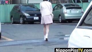 NipponPissTV.com - Japanese teenie soaking herself up with warm pee outdoors