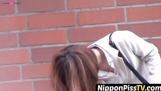 NipponPissTV.com - Japanese teenie soaking herself up with warm pee outdoors
