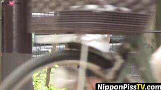 NipponPissTV.com - Classy Japanese redhead finds a secret place to pee outdoors