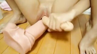 Asian Amateur Uses Huge Dildos